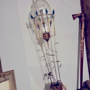 Vintage art piece of hot air balloon made by John Demont